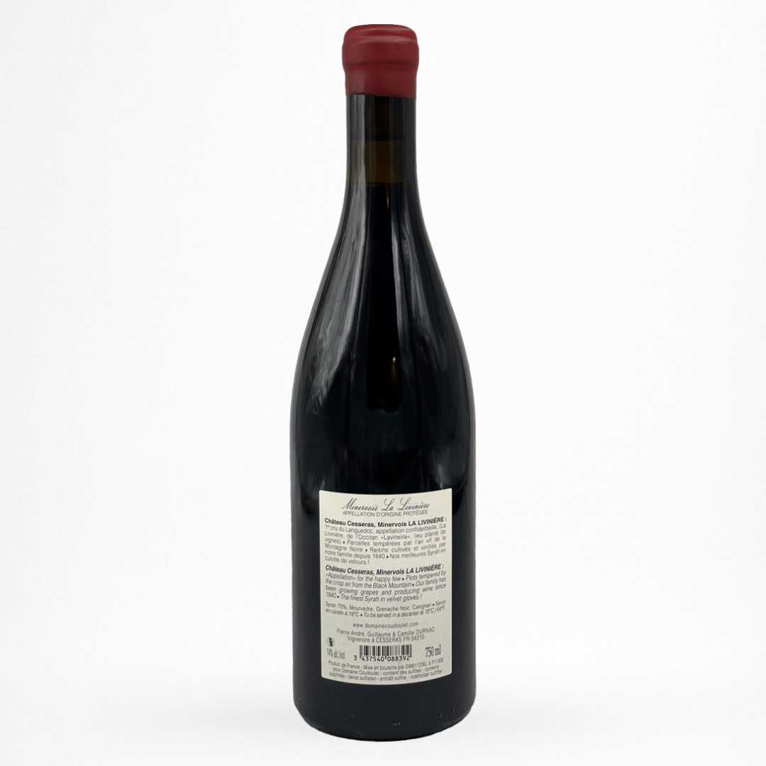 Bouteille Château de Cesseras — Minervois-La Livinière AOP (Languedoc), contre etiquette vin rouge, sur fond blanc.