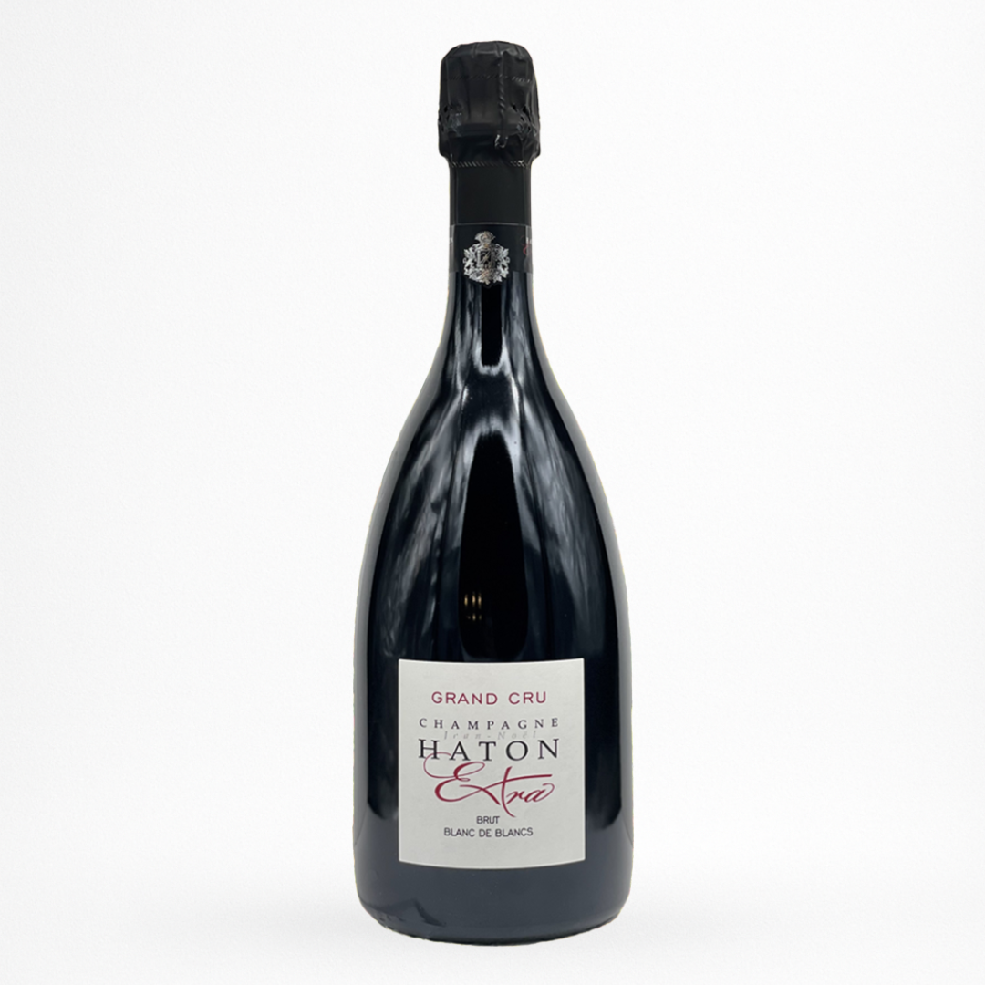 Bouteille de La Cuvée Blanc de Blancs Extra Grand Cru NV Champagne Haton, Champagne, vin effervescent blanc, vue de face sur fond blanc