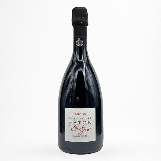 Bouteille de La Cuvée Blanc de Blancs Extra Grand Cru NV Champagne Haton, Champagne, vin effervescent blanc, vue de face sur fond blanc