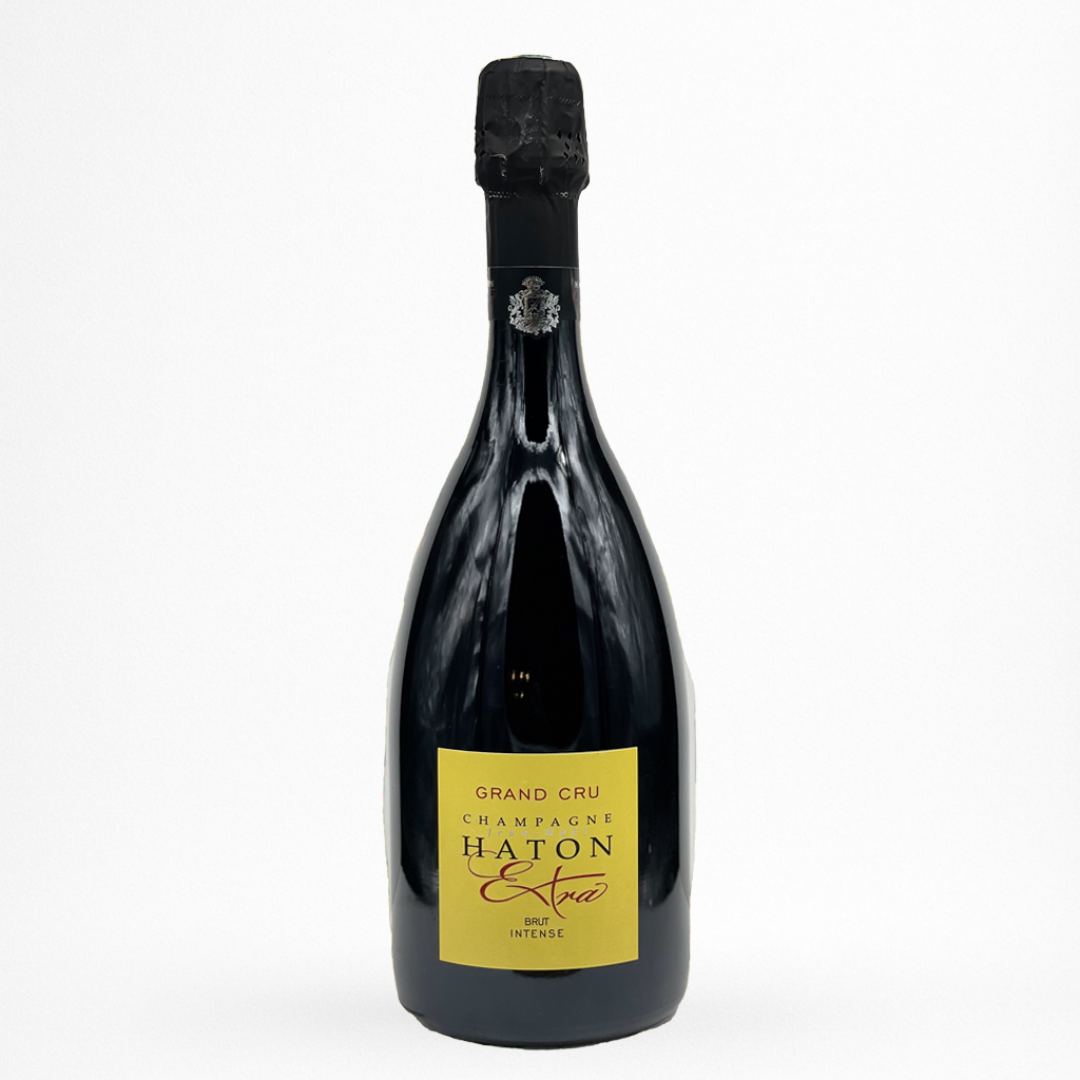 Bouteille de La Cuvée Brut Intense Extra Grand Cru NV Champagne Haton, Champagne, vin effervescent blanc, vue de face sur fond blanc