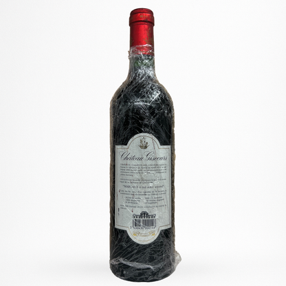 Château Giscours 1990 – Margaux (Grand Cru Classé 1855), vin rouge de Bordeaux, contre etiquette bouteille ancienne packshot sur fond blanc