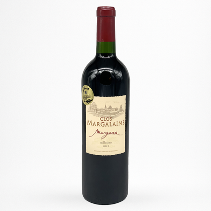 Bouteille de vin rouge Clos Margalaine 2013 Margaux, étiquette crème avec château, capsule rouge