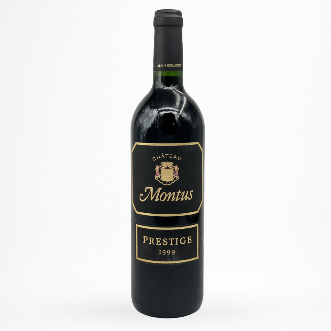 Bouteille de vin rouge Château Montus Prestige 1999 Madiran, étiquette noire bord doré, capsule noire, fond blanc