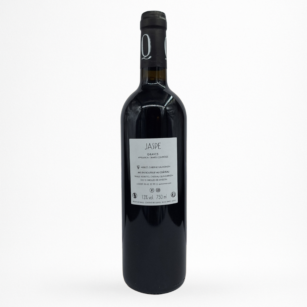 Bouteille Château de Quincarnon “Jaspe” — Graves AOC, vin rouge, contre étiquette blanche, sur fond blanc.